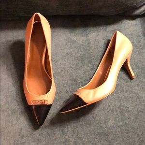 Never worn Coach pumps